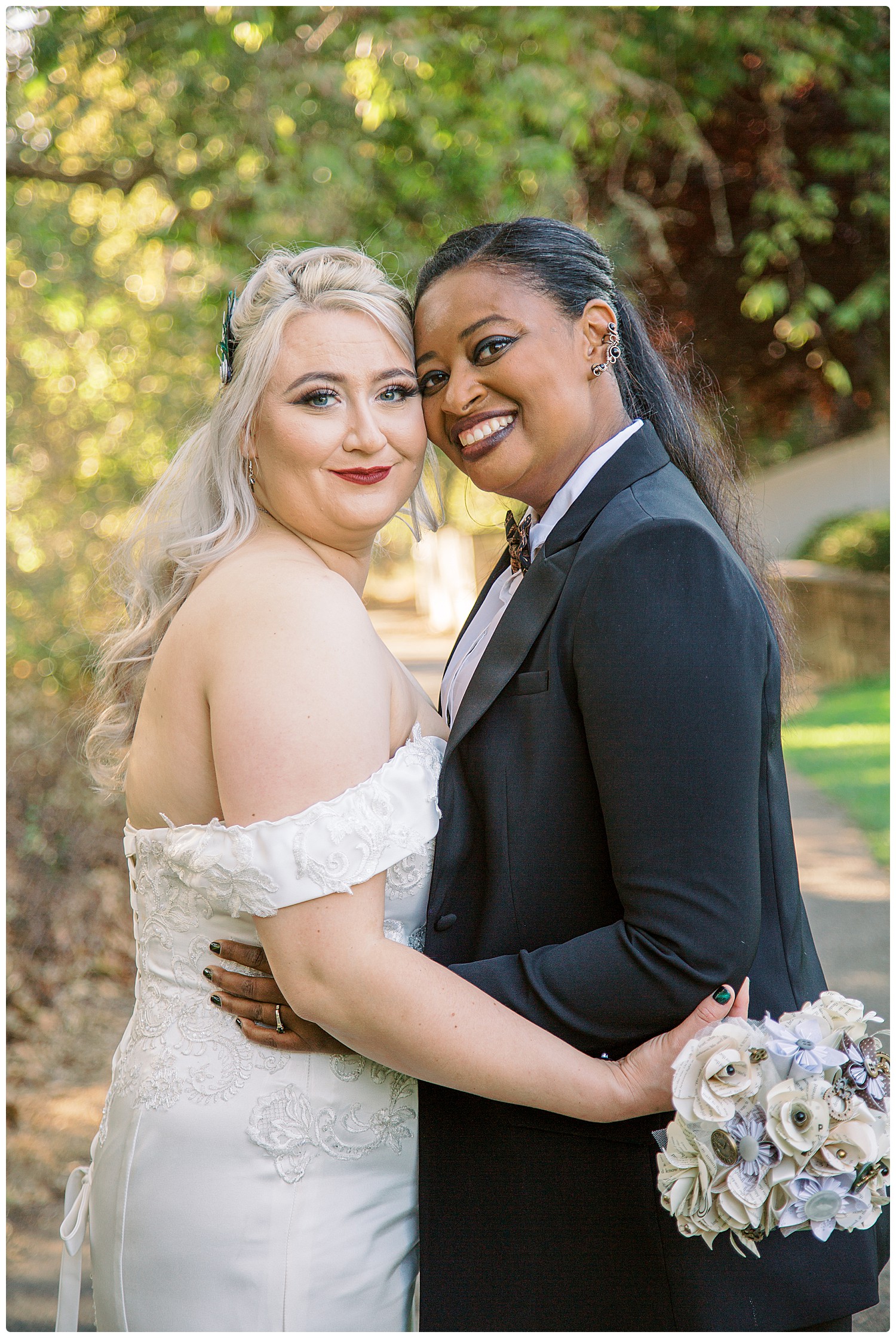 California wedding photographer - brides cheek to cheek smiling at the camera- Avila Beach California wedding