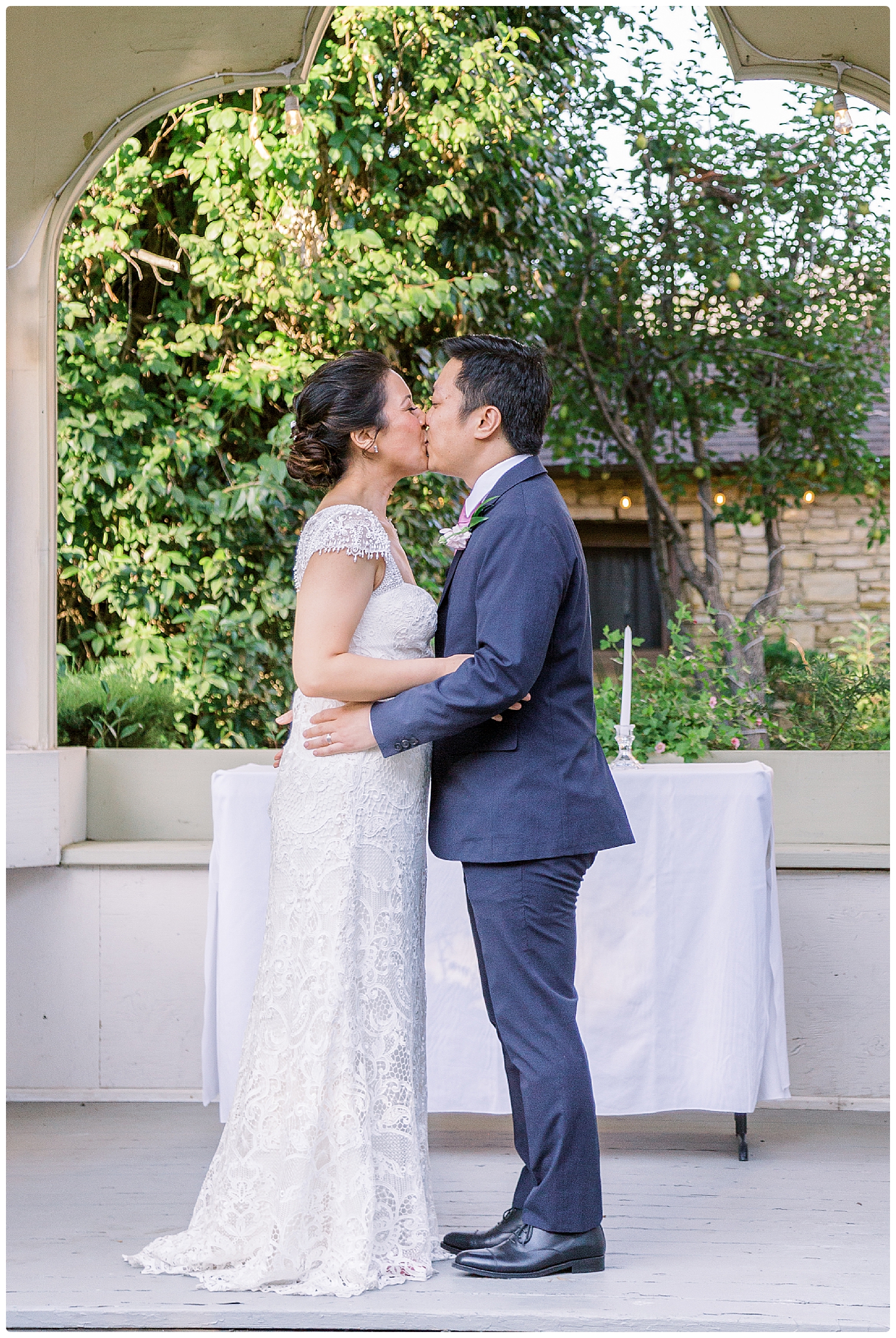 Bride and groom kiss captured by Renoda Campbell wedding photographer in San Luis Obispo, CA
