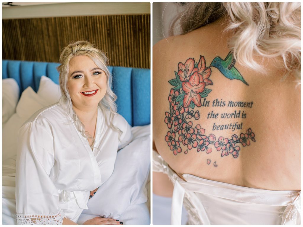 bride smiling as she gets ready for her wedding and the tattoo saying on her back