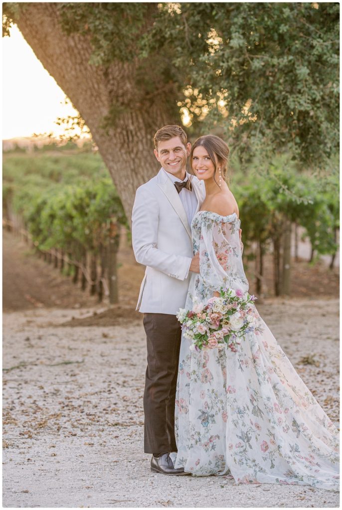bride and groom smiling in the winery