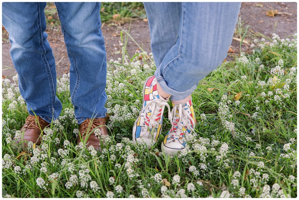 fun engaged couple's shoes