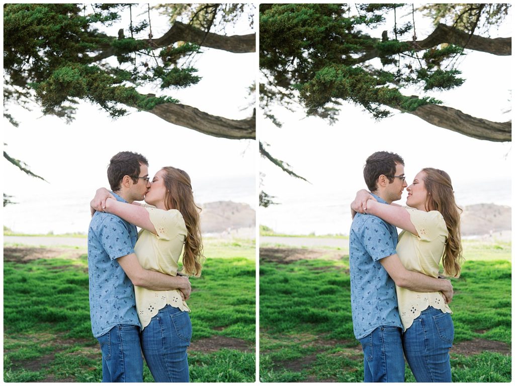 engaged couple kissing under large tree 2