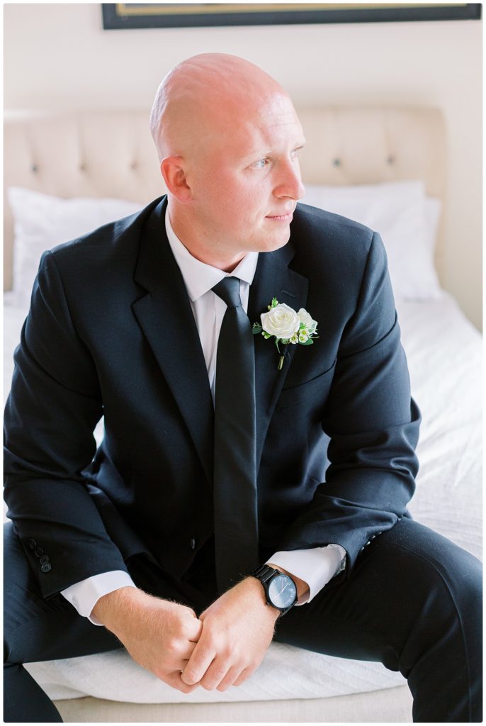 Groom looking to the side of the room