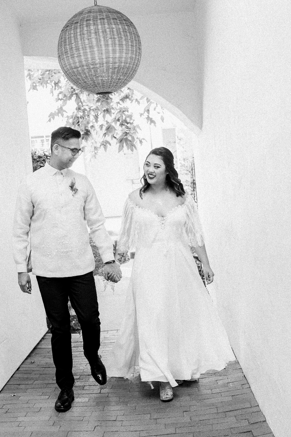 wedding couple in hotel walking to get married