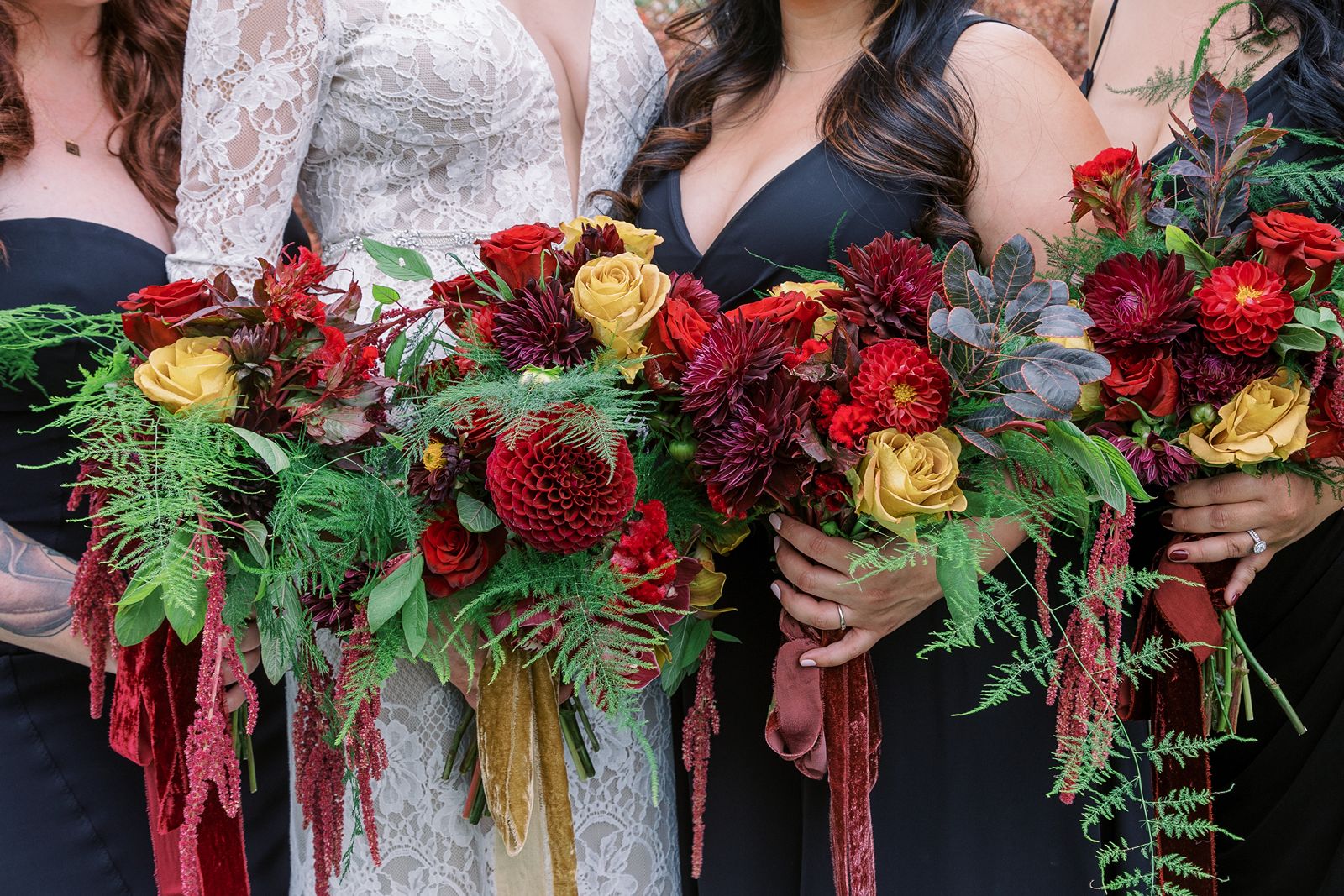 Bridal party holding their ceremony flowers