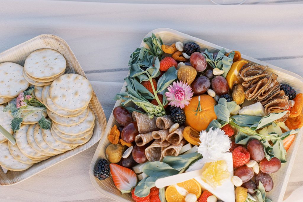 crackers and cheese fruit and meat plate wedding vendor