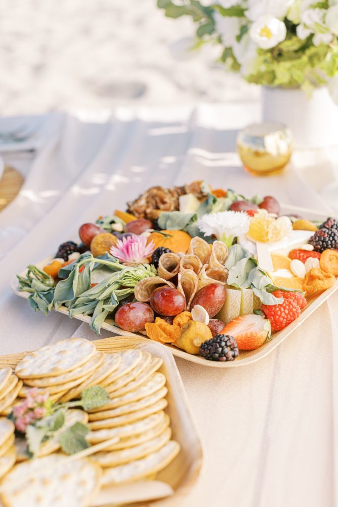 cheese meat and cheese tray on picnic table-Renoda Campbell Photography