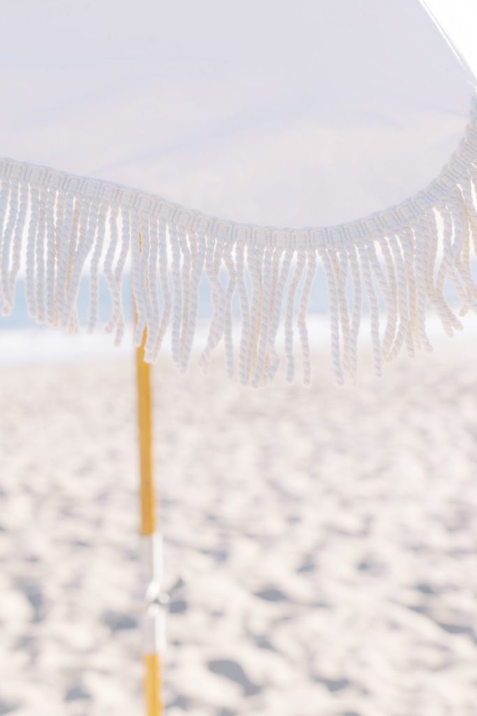 close up of umbrella fringe from beach picnic